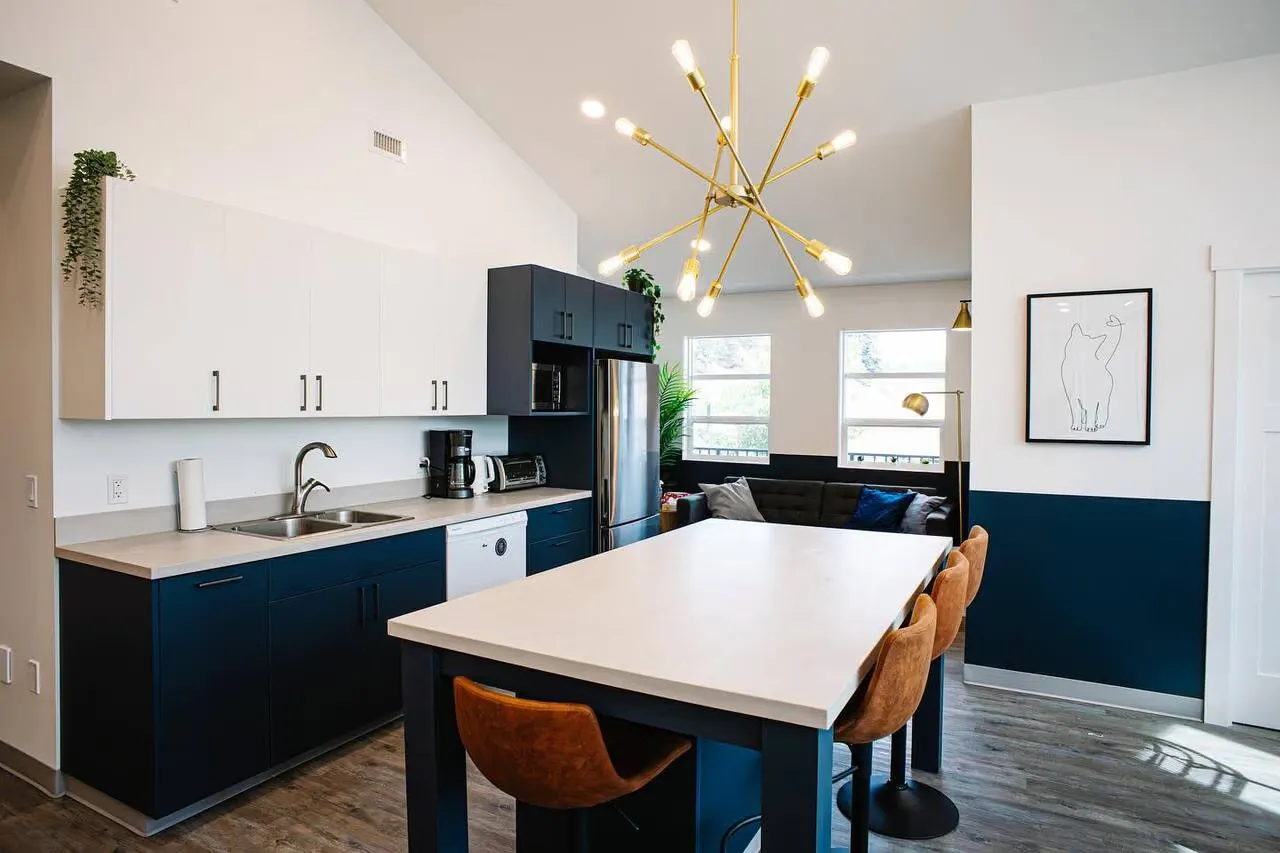 Central Animal Hospital staff area with a navy island and custom cabinetry