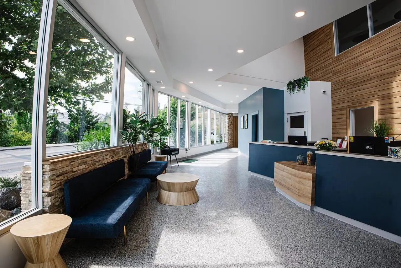 Central Animal Hospital corridor with a bench seat and reception beyond