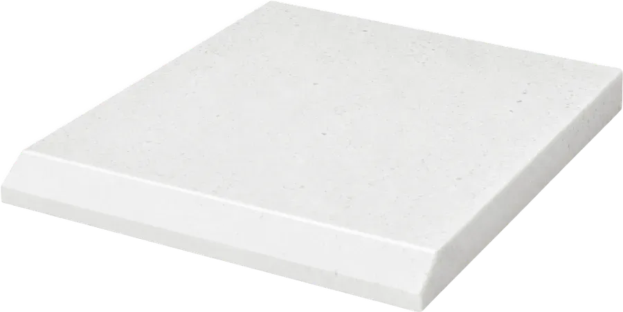 An offcut of white solid surface countertop with a bevelled edge