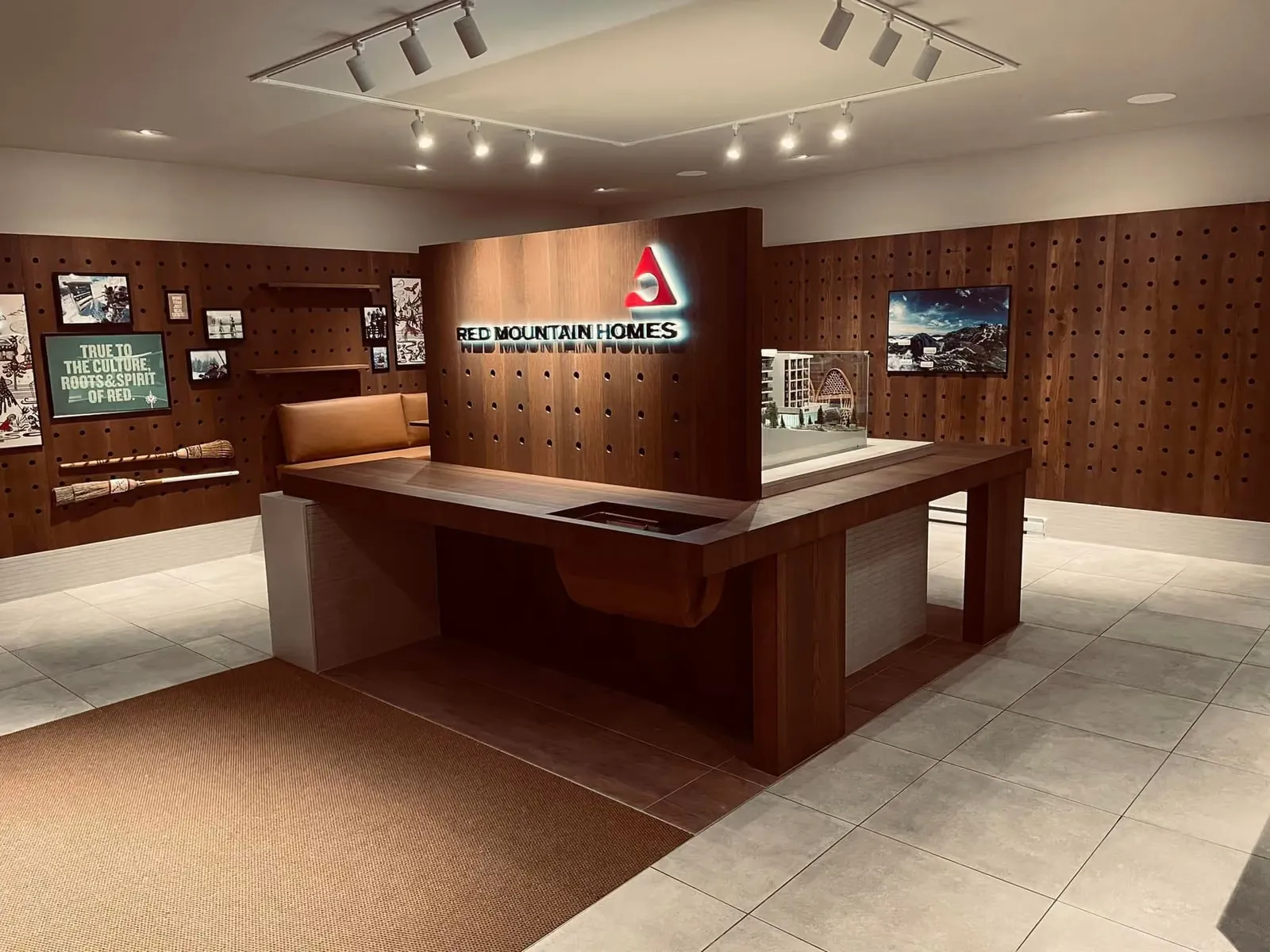 RED Mountain presentation centre seating area beside the sample display wall