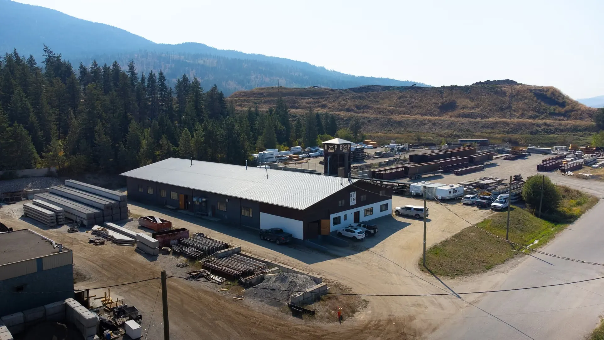 Aerial view of the P5 Millwork shop on Industrial Drive in Armstrong, BC, with the P5 sign on the gable